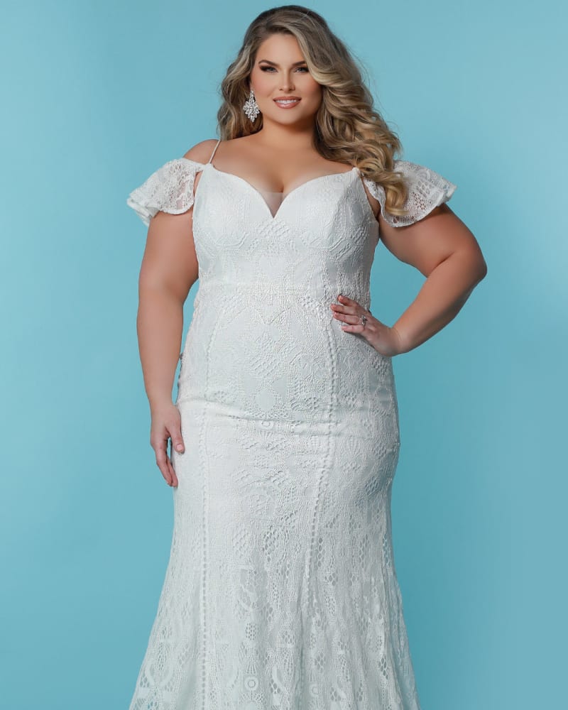 Front of a model wearing a size 16 Celeste Wedding Dress in Ivory/Ivory by Sydney's Closet. | dia_product_style_image_id:285798